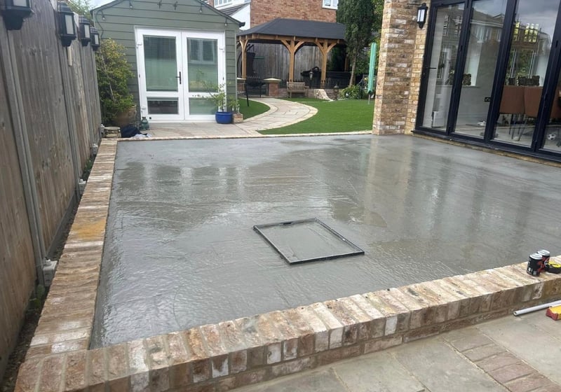 Finished resin patio and landscaping at a domestic property
